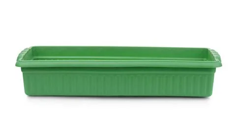 Front view of empty green plastic seedling tray Front view of empty green ... Stock Photos