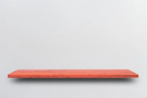 Front view empty wooden shelf and grey wall. Design concept Stock Photos