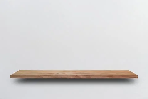 Front view empty wooden shelf and grey wall. Design concept Stock Photos