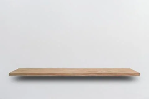 Front view empty wooden shelf and grey wall. Design concept Stock Photos