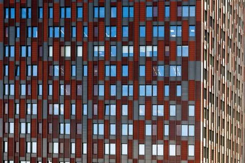Front view on a facade of modern office building as texture, background, abst Stock-Fotos
