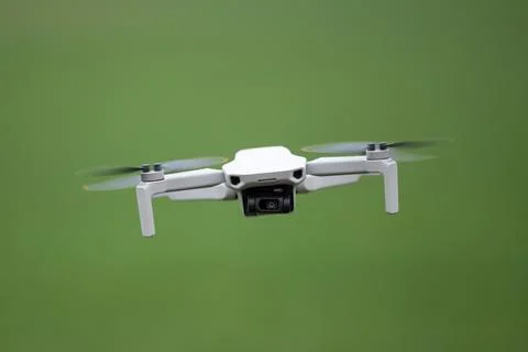 Front view of a flying drone with a camera Stock Photos