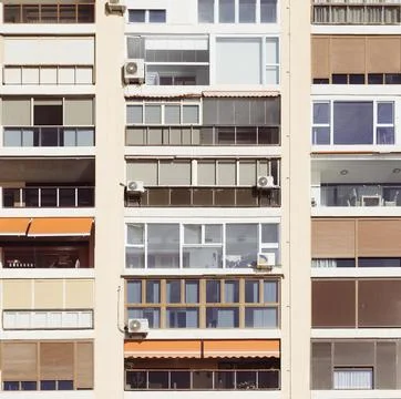 Front view of generic high-rise apartment building Stock Photos