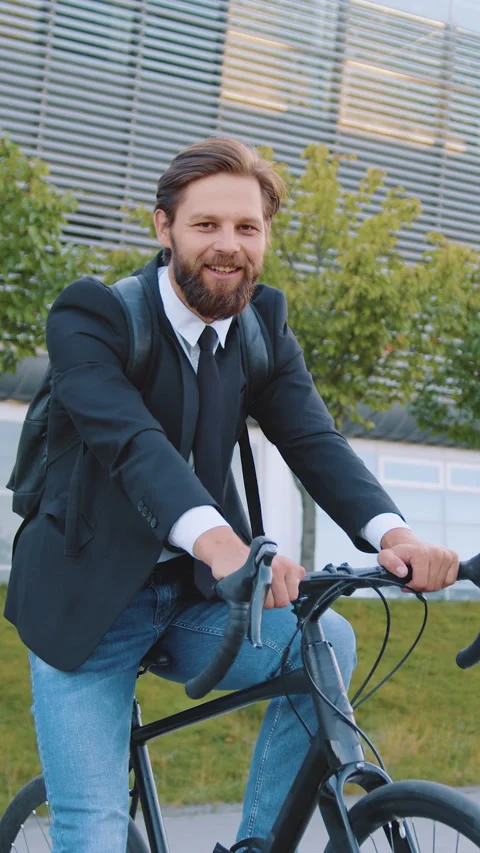 Front view of good-looking joyful happy 30-aged male office manager with well-ma Stock Footage 325052531