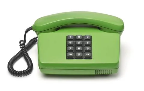  Front view of green classic push-button landline phone Front view of gree... Stock Photos