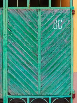 Front view of green gate. Stock Photos