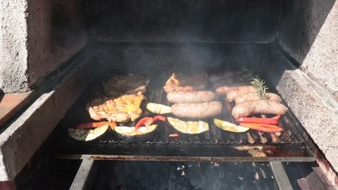 Front view of grilled meat and vegetables Stock Footage 88200631