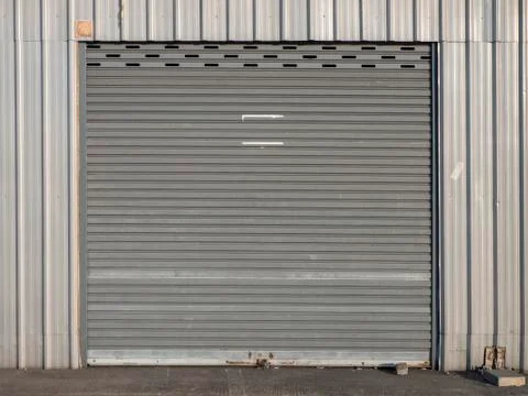 Front view of grunge close shutter door or rolling door Stock Photos