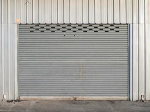 Front view of grunge close shutter door or rolling door Stock Photos