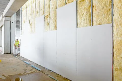 Front view of gypsum wall, plasterboard is under construction Stock Photos