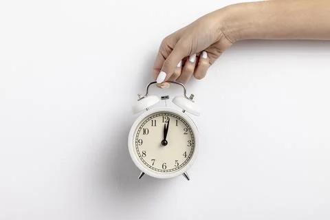 Front view hand held clock with copy space Resolution and high quality Stock Photos