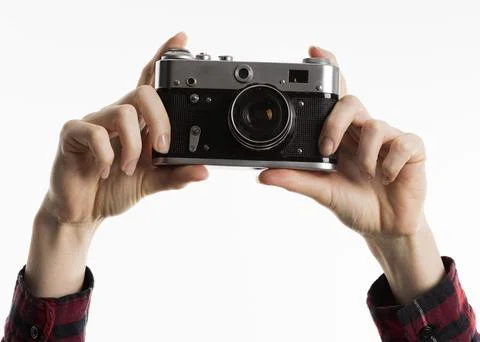 Front view hands using camera Stock Photos