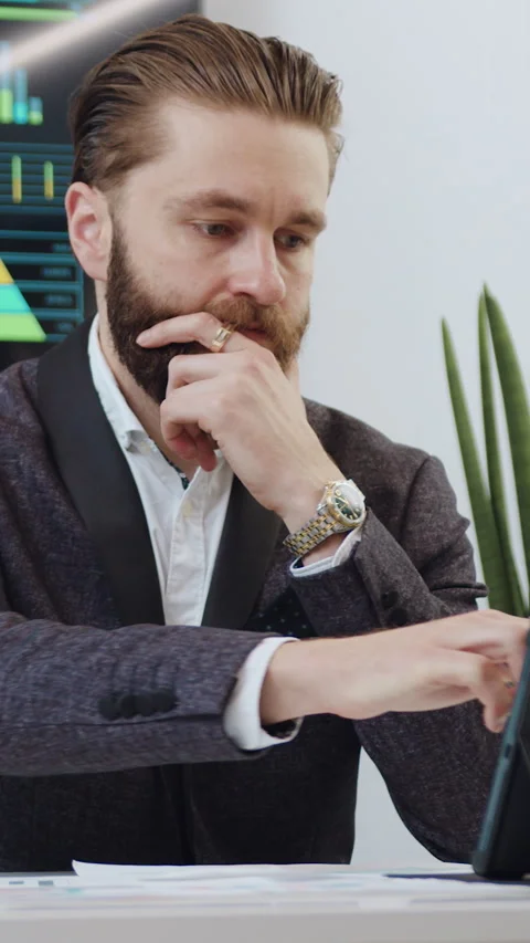 Front view of handsome high-skilled concentrated purposeful 35-aged bearded corp Stock Footage 330800155