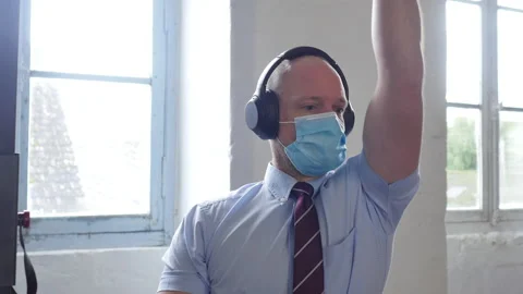 Front view of handsome man wearing tie and shirt doing vertical pull to exercise Stock Footage 145555548