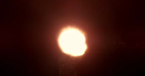 Front view high-speed explosion isolated on black background Stock Footage 327902844