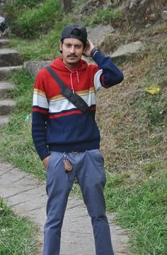 Front view of a Indian young guy with wearing cap backwards Stock Photos