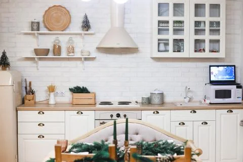 Front view of kitchen table in fancy bright kitchen Stock Photos