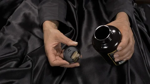 Front view - lady opens a vitamin jar 4k Video stock 96281719