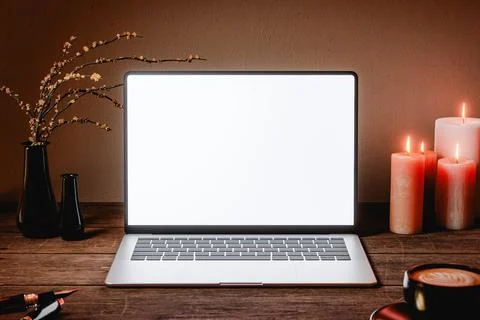 Front view laptop mock up with blank white screen on wooden rustic desk. 3d.. Illustrazione stock