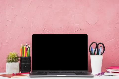 Front view laptop with stationery elements Stock Photos