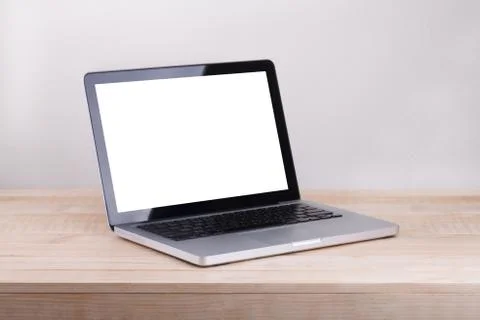 Front view of the laptop is on the work table concrete background Stock Photos
