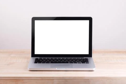 Front view of the laptop is on the work table concrete background Stock Photos