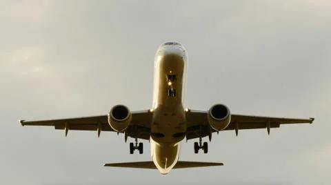Front view of large airplane landing at airport. air traffic and transportation Stock Photos