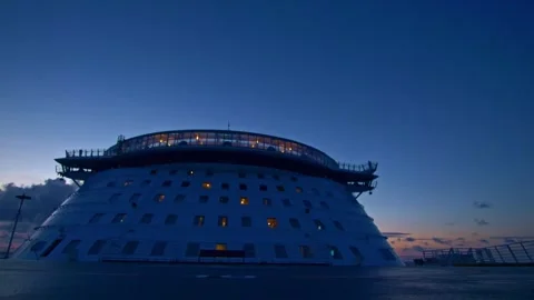 Front view of a large cruise ship sailing at sunset Stock Footage 291475921