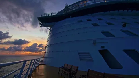 Front view of a large cruise ship sailing at sunset Stock Footage 291475950