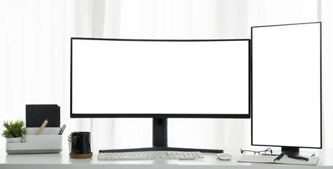 Front view of large curved and vertical computer monitor with blank display.. Stock Photos