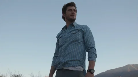 Front View of Man on a Hike Looking in the Distance Stock Footage 95932648