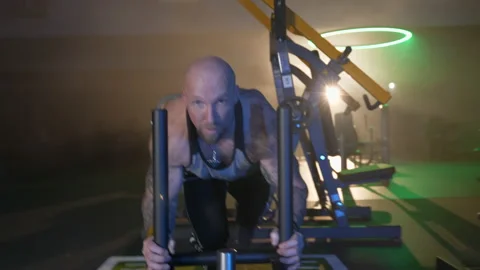 Front View Of A Man Pushing Weighted Sle... | Stock Video | Pond5