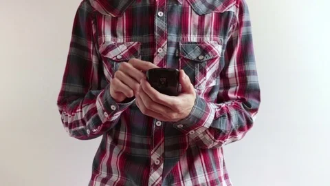 Front view of man uses smartphone Stock Footage 79610472