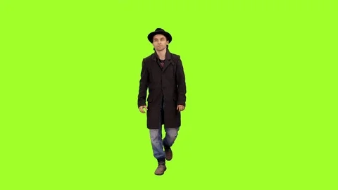 Front view of a man walks and smiling on a green screen background, Full HD shot 스톡 동영상 71757873