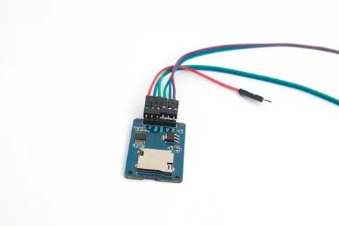 Front view of a microSD card reader module with its connecting cable. This mo Stock Photos