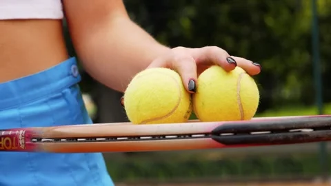 Front view mid section of a young Caucasian woman playing tennis on a sunny day Video stock 139919243