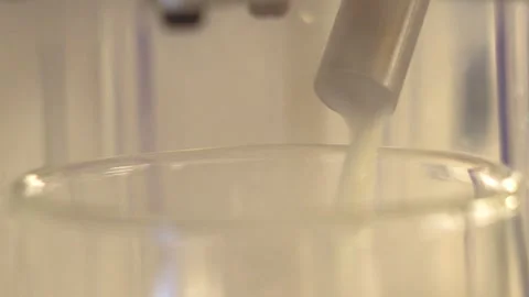 Front View of Milk Frother Nozzle on Coffee Machine Adding Milk to Latte. Stock Footage 345919340