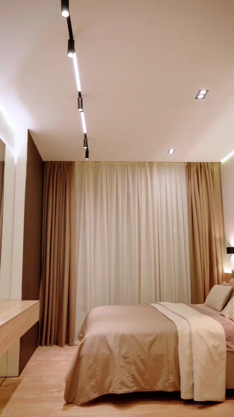 Front View of Modern Bedroom with Full Height Curtains Stock Footage 342861465