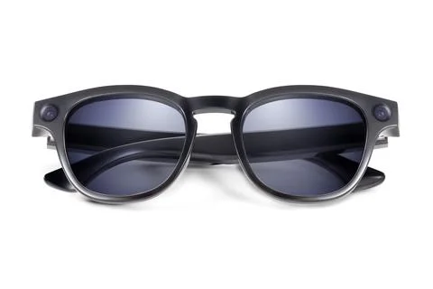 Front view of modern black smart sunglasses with blue lenses and integrated.. Stock Photos