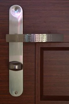 Front view to modern chrome handle on dark brown wooden door Stock Photos