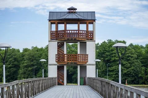 Front view of a modern observation tower with a wooden balcony Stock Photos
