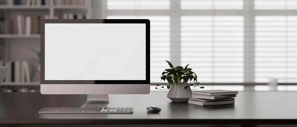 Front view of a modern workspace in a modern office room with a PC desktop .. 스톡 일러스트