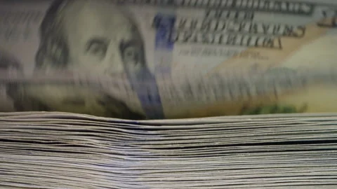 Front view of a money counting machine processing 100 dollar bills. Modern Stock Footage 340026513