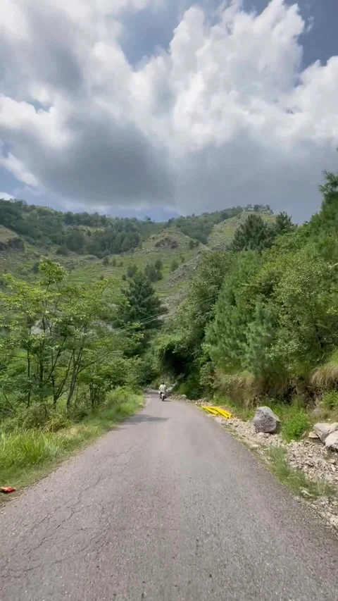 Front View Motorcycle Ride on Scenic Mountain Road in Abbottabad KPK Pakistan 스톡 동영상 343613998