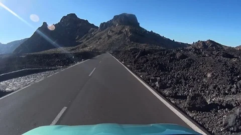 Front view from a moving car going strait to mountain Stock Footage 72183379