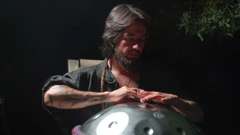 Front view musician playing handpan 24 Haziran 2026 fethiye mugla turkey Stock Footage 341531320