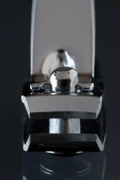 Front view of nail clipper isolated on grey  background. Close up with blurry Stock Photos