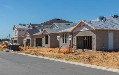 Front view of new homes under construction in Florida Stock Photos