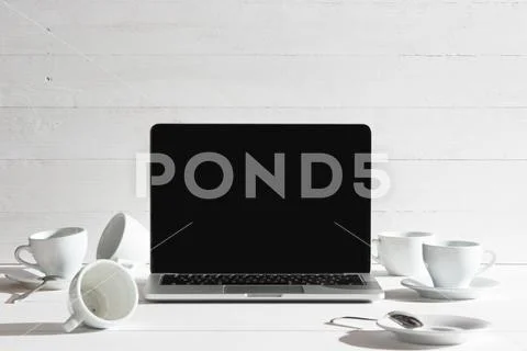 The front view of notebook and cup of coffee. Inspiration and mock-up concept Stock Photos