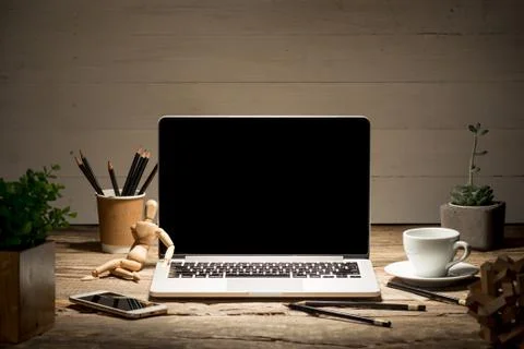 The front view of notebook and cup of coffee. Inspiration and mock-up concept Stock Photos